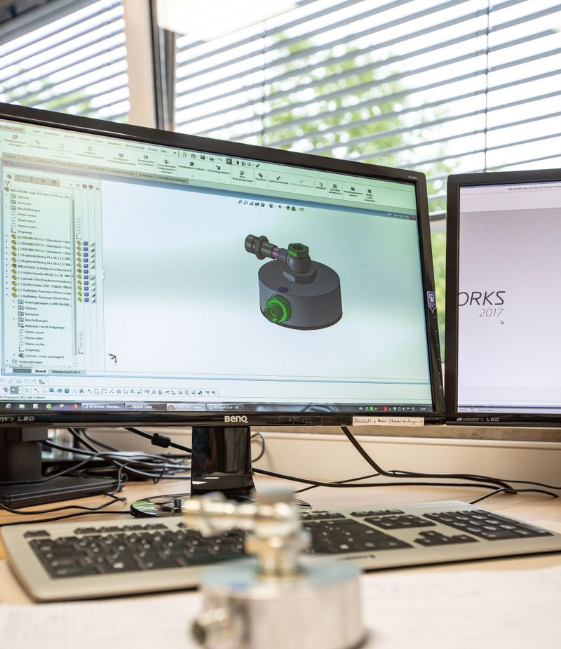 3D-Modell eines Adapters für die Automatikgetriebespülung in SOLIDWORKS